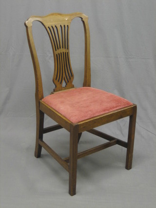 A 19th Century bleached mahogany Georgian style dining chair with upholstered drop in seat raised on square tapering supports