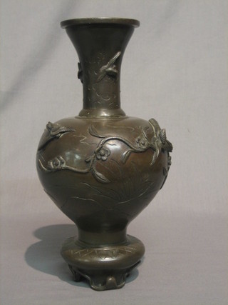 A 19th Century Oriental bronze club shaped vase decorated birds, raised on a circular foot with character mark to base 12"