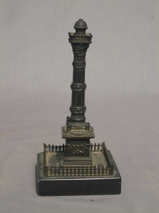 A 19th/20th Century bronze figure of a column, raised on a marble base, 6"