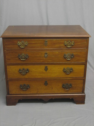 A 19th Century mahogany chest of 4 long drawers with brass handles, raised on bracket feet 36"