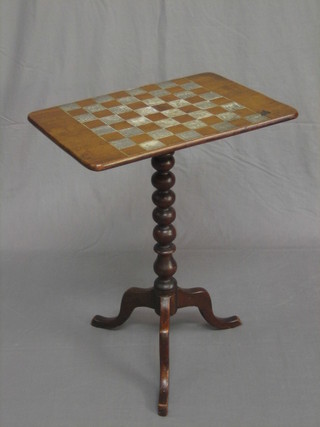 A 19th Century rectangular mahogany snap top chess table, raised on pillar and tripod supports 20"