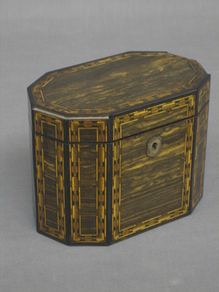 A Victorian Coromandel lozenge shaped tea caddy with hinged lid and inlaid parquetry decoration 6 1/2"