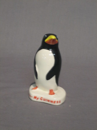 A Carltonware figure of a standing penguin, the base marked My Goodness My Guinness 4", the base with red mark