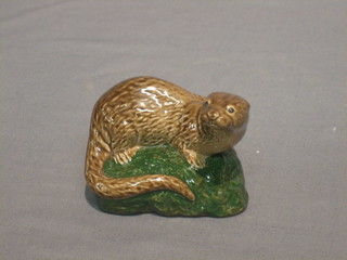 A Wade whiskey decanter for Peter Thomson Whiskey in the form of a seal