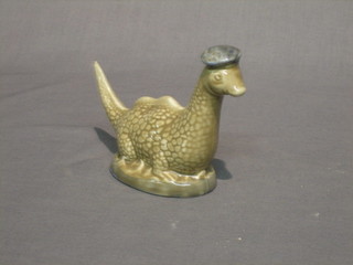 A Wade whiskey decanter for Peter Thomson in the form of the Loch Ness Monster