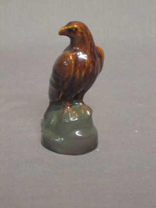 A Wade whiskey decanter for Peter Thomson in the form of an eagle