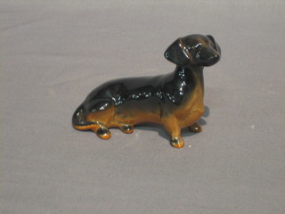 A Beswick figure of a seated black Dachshund 3"