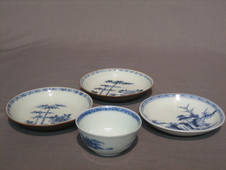 A Nankin blue and white teabowl 2", together with 3 saucers the bases all with Christies labels marked Christies Nankin Cargo