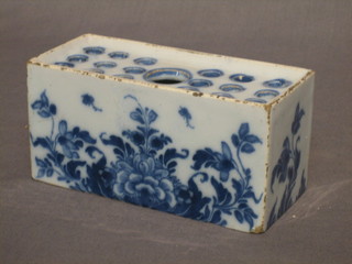An Oriental blue and white porcelain flower block 5 1/2" chips to base