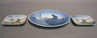 A circular Royal Copenhagen plate decorated The Little Mermaid 8" and 2 pin trays 4" (1 with chips)