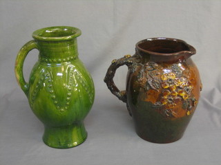 A large brown glazed Longpark Torquay vase 12" and a similar green glazed vase 14"