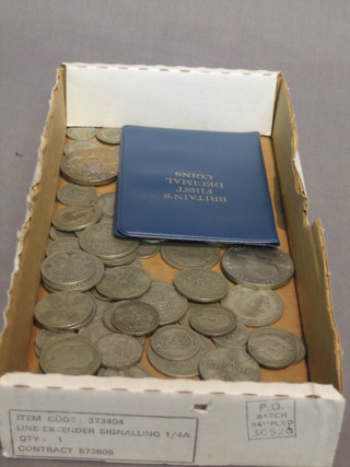 A collection of various silver coins