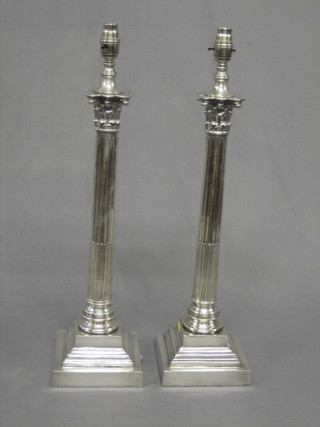 A pair of modern silver plated stepped and reeded table lamps with Corinthian capitals 19"