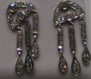 A pair of lady's drop earrings set numerous diamonds (approx 0.85ct)