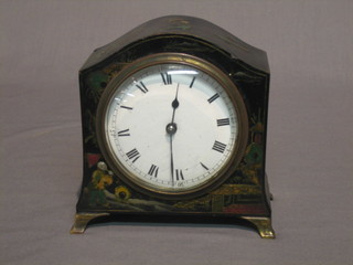 A 1930's, 28 day bedroom timepiece with porcelain dial and Roman numerals contained in an oval Chinoiserie style case