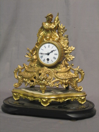 A 19th Century French 8 day clock with enamelled dial and Roman numerals contained in a gilt spelter case, surmounted by a figure of a soldier