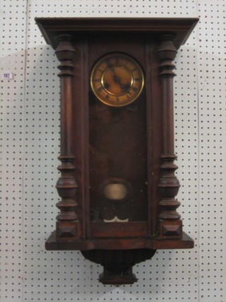 A 19th Century striking Vienna style regulator with 5" circular paper dial, having a  grid iron pendulum and contained in a pine case