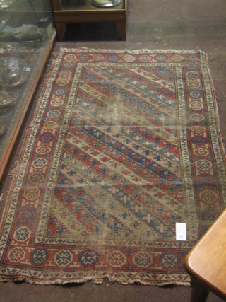 A 19th Century Caucasian rug with geometric design to the centre and multi-row borders (heavily worn) 83" x 49"