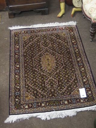 A fine quality 20th Century Persian rug with central medallion 47" x 30"