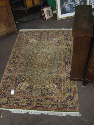 A Belgian cotton green ground Persian style rug 90" x 59"
