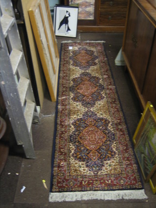 A contemporary Belgian cotton blue ground and floral pattern Persian style runner 109" x 29"
