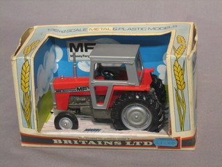A Britains model of a Massey Ferguson Tractor no. 9522