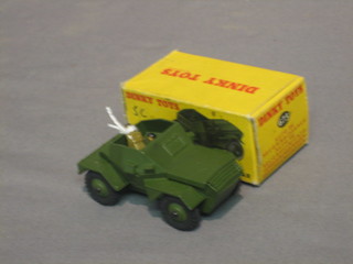 A Dinky 673 Scout Car complete with figures, boxed