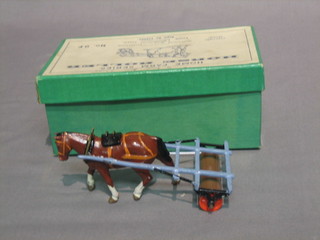 A Britain's Farm Series horse roller complete with farm hand, no. F9, boxed 