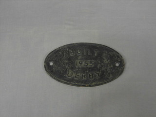 A cast iron railway oval locomotive plate marked Built 1955 Derby, 11"