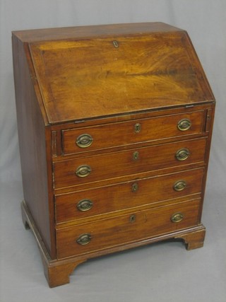 A Georgian mahogany bureau, the fall front revealing a well fitted interior with pigeon holes and drawers etc, above 4 long drawers, raised on bracket feet, 29"