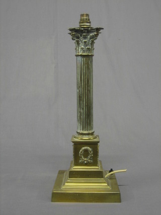 A reeded brass table lamp with Corinthian column capital 17"