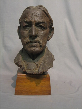 A plaster head and shoulders portrait bust of a gentleman 30", raised on a wooden base