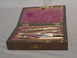 A geometry set contained in a rosewood box