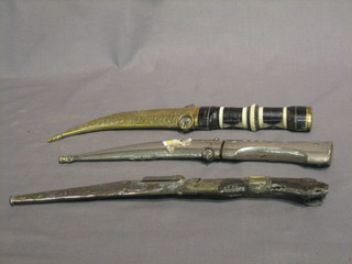 An Eastern dagger 10" and 2 other Eastern daggers