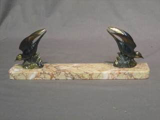 A French Art Deco pink veined marble and spelter sculpture in the form of 2 diving birds 15"