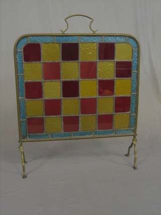 A brass fire screen with stained glass panel 21"