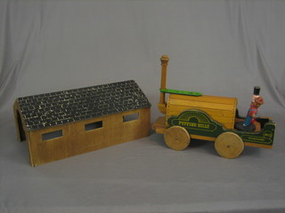 A wooden model of a locomotive "Puffing Billy" Wylam Railway, together with a wooden engine shed