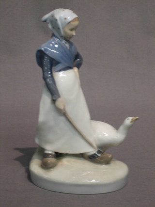 A Royal Copenhagen figure of a standing lady with goose, the base marked GB528 13"