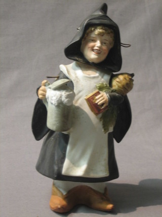 A Continental biscuit porcelain figure of a standing nun with foaming stein of beer 7"