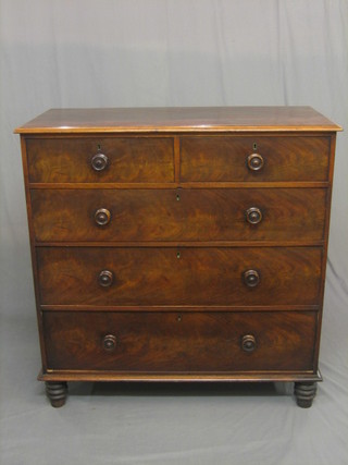 A Victorian rectangular mahogany chest of 2 short and 3 long drawers with tore handles, raised on turned supports 42"