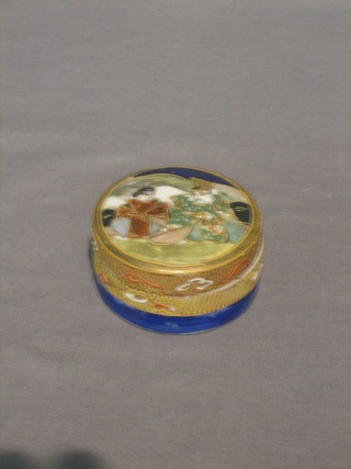 A circular Japanese porcelain painted trinket box and cover 2"