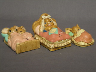 3 various Pendelfin figures of rabbits in bed