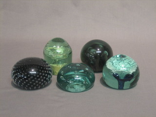 5 various green glass paperweights