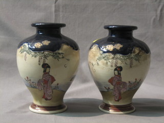 A pair of late Japanese Satsuma porcelain vases decorated figures in gardens 7"