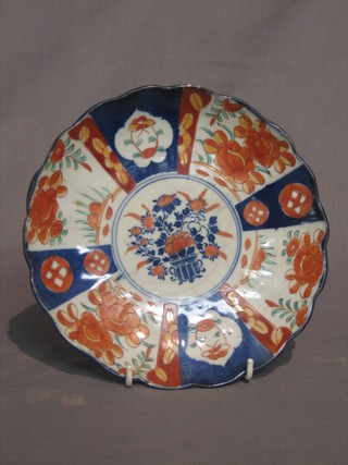 A 19th Century Japanese Imari porcelain plate with lobed borders 9"