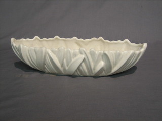 A Sylvac boat shaped white glazed vase with reed decoration 14"