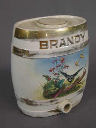 A 19th Century oval pottery brandy barrel, decorated a bird and with gilt metal banding (some rubbing) 14"