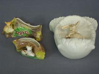 A Sylvac pottery wall pocket decorated a rabbit 8" together with 2 Hornsea vases in the form of tree stumps