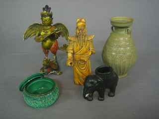 An Oriental glazed club shaped vase 6", a green glass jar and cover 3", a black glazed pottery figure of an elephant, an Oriental figure of sage (f) and a gilt figure of an Oriental mythical warrior