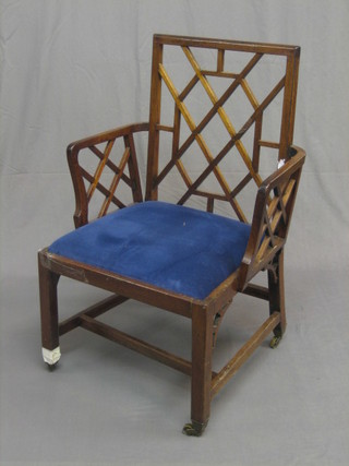 A 19th Century Chinese Chippendale style library chair with H framed stretcher